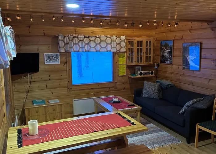 Pusikko - Cozy - Ice Swimming - Sauna - Fireplace - Barbeque Shed Chalé